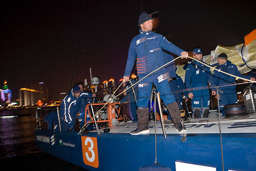 Thomas Johansson (FIN) onboard E3 as they leave the dock. Ericsson 3 arrives a few hours after the start of Leg 5 in the Volvo Ocean Race from Qingdao, China to Rio de Janeiro, Brazil. Photo copyright Oskar Kihlborg / Ericsson Racing Team / Volvo Ocean Race.