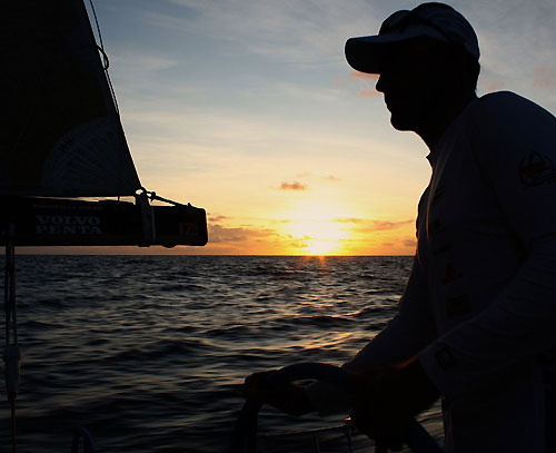 Xabier Fernandez driving Telefonica Blue, at sunset, on leg 5 of the Volvo Ocean Race, from Qingdao to Rio de Janeiro. Photo copyright Gabriele Olivo / Telefonica Blue / Volvo Ocean Race.