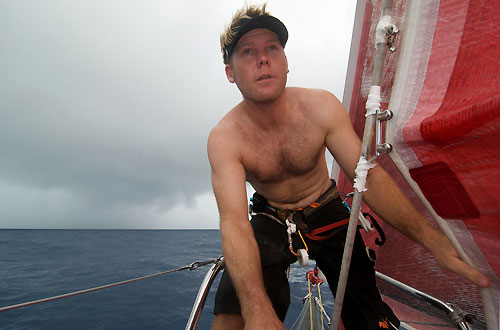 Casey Smith raises the jib onboard il mostro, in the Doldrums, on leg 5 of the Volvo Ocean Race. Photo copyright Rick Deppe / PUMA Ocean Racing / Volvo Ocean Race.