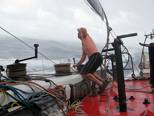 Erle Williams gets wet on PUMA Ocean Racing in a rain downpour in the Doldrums, on leg 5 of the Volvo Ocean Race.