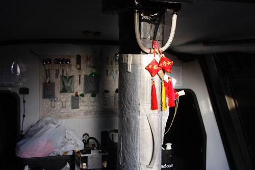 Chinese charms hang from the mast for a safe Journey for Green Dragon, on leg 5 of the Volvo Ocean Race, from Qingdao to Rio de Janeiro. Photo copyright Guo Chuan / Green Dragon Racing / Volvo Ocean Race.