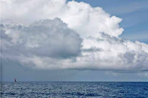 PUMA Ocean Racing on the horizon underneath huge rain clouds in the Doldrums, on leg 5 of the Volvo Ocean Race, from Qingdao to Rio de Janeiro. Photo copyright Gustav Morin / Ericsson 3 / Volvo Ocean Race.