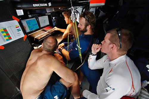 Ericsson 3 crew talk tactics at the navigation station, during leg 5 of the Volvo Ocean Race, from Qingdao to Rio de Janeiro. Photo copyright Gustav Morin / Ericsson 3 / Volvo Ocean Race.