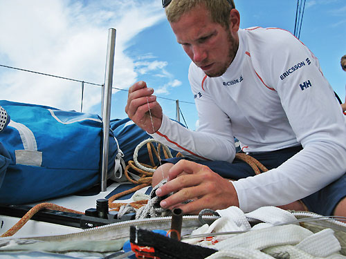 Martin Krite sewing ropes onboard Ericsson 3, on leg 5 of the Volvo Ocean Race, from Qingdao to Rio de Janeiro. Photo copyright Gustav Morin / Ericsson 3 / Volvo Ocean Race.