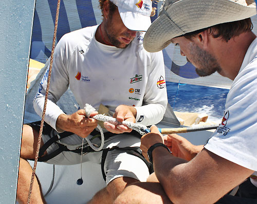 David Vera and Michael Pammenter repairing a halyard onboard Telefonica Blue, on leg 5 of the Volvo Ocean Race, from Qingdao to Rio de Janeiro. Photo copyright Gabriele Olivo / Telefonica Blue / Volvo Ocean Race.