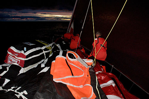 Checking sails ready for the Southern Ocean, onboard PUMA Ocean Racing, on leg 5 of the Volvo Ocean Race, from Qingdao to Rio de Janeiro. Photo copyright Rick Deppe / PUMA Ocean Racing / Volvo Ocean Race.