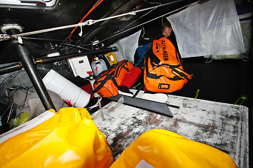 Boat Captain Jens Dolmer preparing for a few days of hard reaching. Everything is being stacked aft, onboard Ericsson 3, on leg 5 of the Volvo Ocean Race, from Qingdao to Rio de Janeiro.