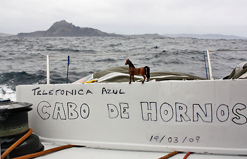 The toy horse which was given to Xabier Fernandez sits on top of Telefonica Blue's Cape Horn sign, with Cabo De Hornos clearly seen in the background. The horse has become a mascot for the crew onboard and will be re-united with Xabier's son when they reach Rio de Janeiro, before they set off with it again on leg 6. Photo copyright Gabriele Olivo / Telefonica Blue / Volvo Ocean Race.