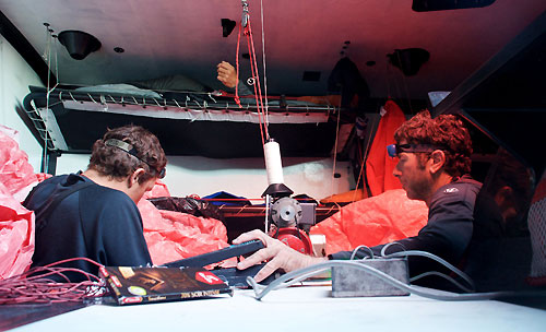 Sail repairs below decks, onboard PUMA Ocean Racing, on leg 5 of the Volvo Ocean Race, from Qingdao to Rio de Janeiro. Photo copyright Rick Deppe / PUMA Ocean Racing / Volvo Ocean Race.