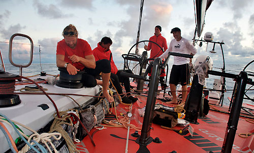 The crew of PUMA Ocean Racing discussing food rations, on leg 5 of the Volvo Ocean Race, from Qingdao to Rio de Janeiro. Photo copyright Rick Deppe / PUMA Ocean Racing / Volvo Ocean Race.