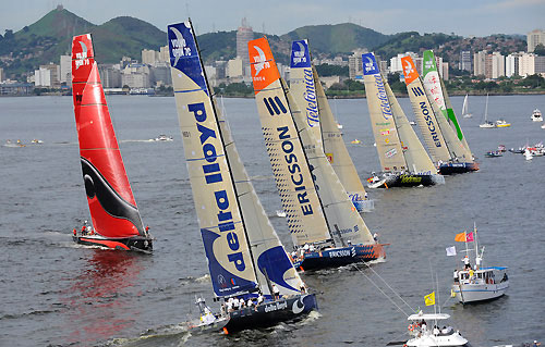 The fleet line up for the start of the Light In-port Race in the Volvo Ocean Race in Rio de Janeiro. Photo copyright Rick Tomlinson / Volvo Ocean Race.