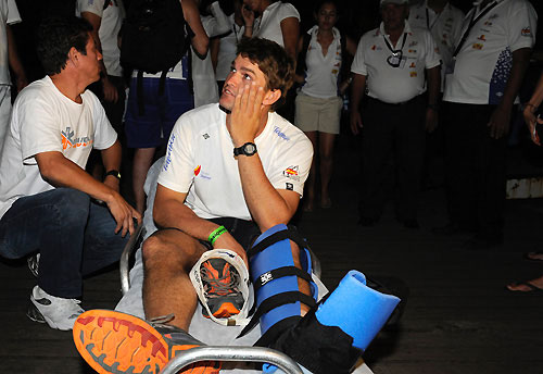 Bowman Michael Pammenter has injured his foot, and was taken back to the Marina da Gloria by a support boat. Under the race rules, the team cannot replace him during this leg. Upon arrival at the marina, Pammenter was transferred to hospital to have his leg and foot examined. Photo copyright Rick Tomlinson / Volvo Ocean Race.