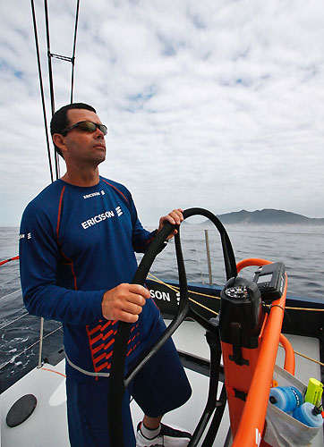 Torben Grael driving, with Cabo Frio in background, on leg 6 of the Volvo Ocean Race, from Rio de Janeiro to Boston. Photo copyright Guy Salter / Ericsson 4 / Volvo Ocean Race.