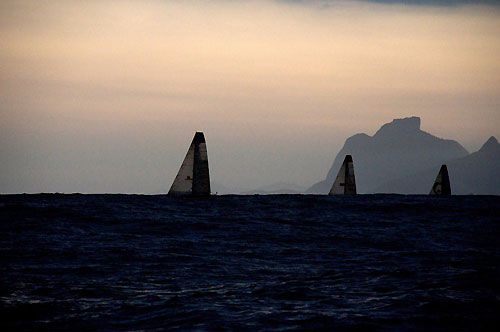 The fleet and the Rio landscape silhouettes from PUMA Ocean Racing, after the start of leg 6 of the Volvo Ocean Race, from Rio de Janeiro to Boston. Photo copyright Rick Deppe / PUMA Ocean Racing / Volvo Ocean Race.
