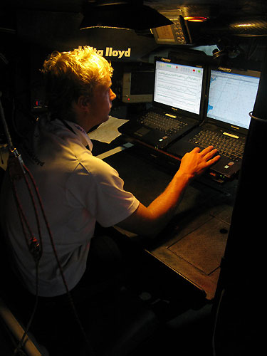 Wouter Verbraak in his new navigation station, working on the tactics to defend the second place when they held it earlier on leg 6 of the Volvo Ocean Race, from Rio de Janeiro to Boston. Photo copyright Sander Pluijm / Team Delta Lloyd / Volvo Ocean Race.