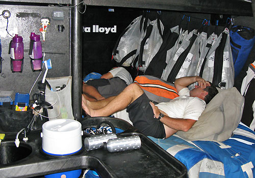 Day two on leg 6 of the Volvo Ocean Race, from Rio de Janeiro to Boston. With only2-3 knots of wind, its good to move the weight as forward as possible, that means sleeping on the sails in the galley. Bowman Morgan White and watch leader Stu Wilson found themselves a good spot on the spinnaker. Photo copyright Sander Pluijm / Team Delta Lloyd / Volvo Ocean Race.