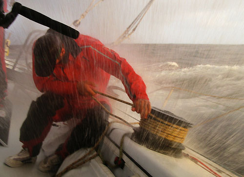Anthony Merrington trimming in rough weather, on leg 6 of the Volvo Ocean Race, from Rio de Janeiro to Boston. Photo copyright Guo Chuan / Green Dragon Racing / Volvo Ocean Race.