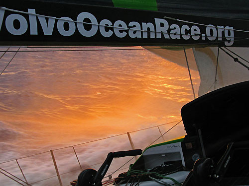 Green Dragon with the sunset lighting up the sea, on leg 6 of the Volvo Ocean Race, from Rio de Janeiro to Boston. Photo copyright Guo Chuan / Green Dragon Racing / Volvo Ocean Race.