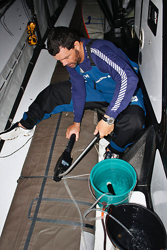 Torben Grael making water after the watermaker failed onboard Ericsson 4, on leg 6 of the Volvo Ocean Race, from Rio de Janeiro to Boston. Photo copyright Guy Salter / Ericsson 4 / Volvo Ocean Race.