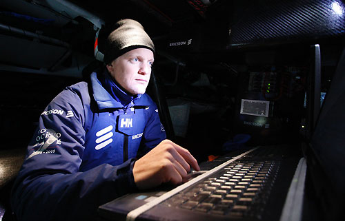 Aksel Magdahl checking the weather charts onboard Ericsson 3, on leg 7 from Boston to Galway. Photo copyright Gustav Morin / Ericsson 3 / Volvo Ocean Race.