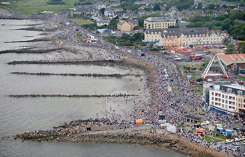 Thousands of spectators gather at Salthill to watch the In-port race in Galway Bay, for the Volvo Ocean Race. Photo copyright Rick Tomlinson / Volvo Ocean Race.