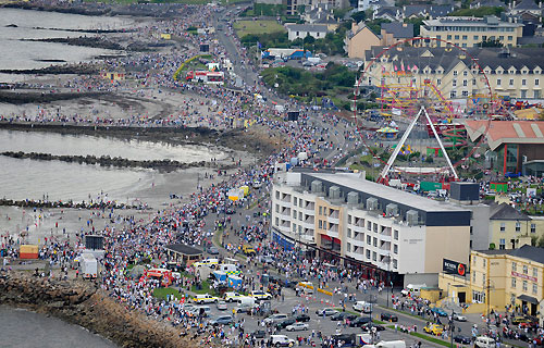 Thousands of spectators gather at Salthill to watch the In-port race in Galway Bay, for the Volvo Ocean Race. Photo copyright Rick Tomlinson / Volvo Ocean Race.