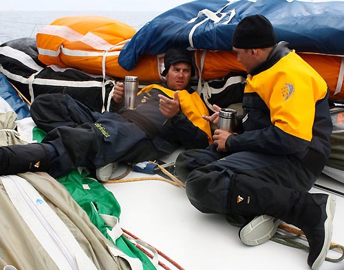 Daryl Wyslang and Xaberi Fernandez counting the boats ahead while having a coffee, on leg 8 of the Volvo Ocean Race, from Galway to Marstrand. Photo copyright Gabriele Olivo / Telefonica Blue / Volvo Ocean Race.