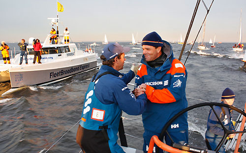 Brad Jackson and Torben Grael celebrate at the end of leg 10 in St Petersburg. Photo copyright Guy Salter / Ericsson 4 / Volvo Ocean Race.