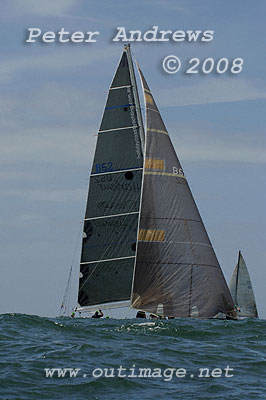 Paul D'Olier's Sydney 41 B52 and Stephen David's Reichel Pugh 60 Wild Joe hiding behind ocean swells in the mouth of Broken Bay ahead of the start of the Pittwater to Pittwater Ocean Race.