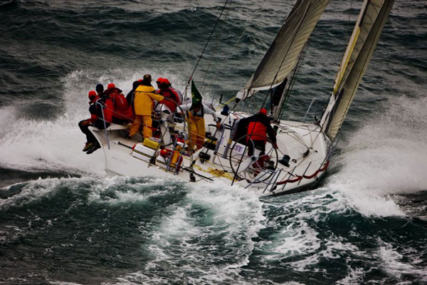 Hong Kong skipper Neil Pryde and his Weldourn 52 Custom Hi Fi, beating out of Victoria Harbour during the Rolex China Sea Race 2008. Photo Copyright ROLEX and Carlo Borlenghi.