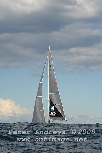 Chris Rabbidge's Mumm 36 FKP Mean Machine, hiding behind a Tasman Sea swell outside the heads after the start of the 2008 Sydney to Gold Coast Yacht Race.