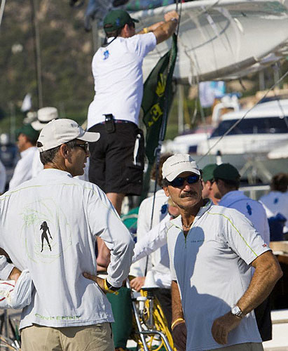 Francesco de Angelis and Paul Cayard of Moneypenny, during dockside preparations at the Yacht Club Costa Smeralda before the start of the Maxi Yacht Rolex Cup 2008. Copyright Rolex and Daniel Forster.