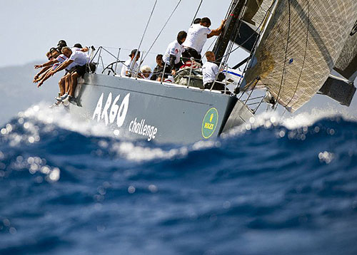 Out on the rail of Carlo Puri Negri's Argo On Atalanta II in the Maxi Yacht Rolex Cup 2008. Copyright Rolex and Kurt Arrigo.