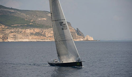 Niklas Zennstrom's TP52 RAN (GBR) with Favignana Island in the background, during the Rolex Middle Sea Race 2008. Photo copyright ROLEX and Kurt Arrigo.