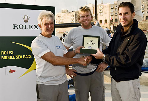 Andres Soriano and Will Best from Alegre with Malcolm Lowell Jr after winning Line Honours for the Rolex Middle Sea Race 2008. Photo copyright ROLEX and Kurt Arrigo.