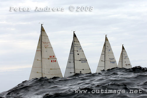 From left to right behind a South Pacific swell are the Sydney 38's of Alan and Tom Quick's Iplex Outlaw; Darryl Hodgkinson's Uplift; Claton, Gordon and Foye's The SubZero Goat; and Tony Walls' Acuity during day 2 of the Rolex Trophy One Design Series. Photo copyright Peter Andrews.