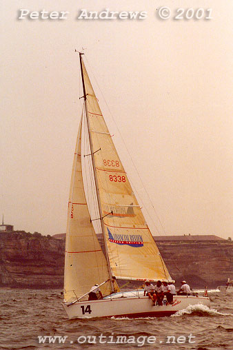 Ed Psaltis and Bob Thomas won the stormswept
                  1998 Sydney Hobart with an earlier Hicks 34, AFR Midnight Rambler<, pictured here under a bushfire coloured
                  sky at the start of the 2001 Sydney Hobart. Photo copyright Peter Andrews.
