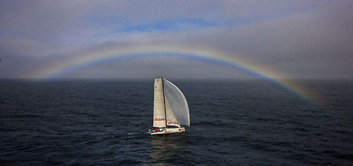 Giovanni Soldini's Class 40 Telecom Italia sails under a rainbow, during the, Rolex Fastnet Race 2009. Photo copyright Rolex - Carlo Borlenghi.