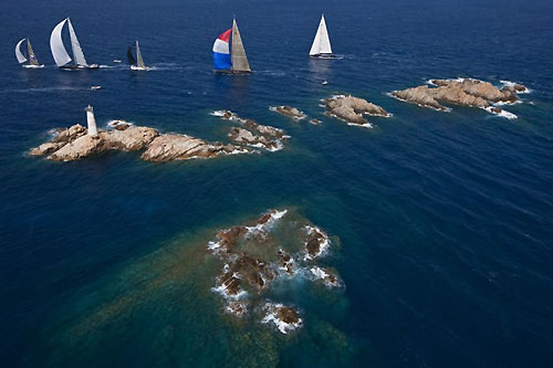 Maxi fleet rounding Monaci Island, during the Maxi Yacht Rolex Cup 2009. Photo copyright Rolex - Carlo Borlenghi.