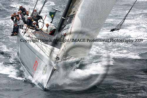 Neville Crichton's 100 foot supermaxi Alfa Romeo, outside Sydney Heads after the start of the Rolex Sydney Hobart Yacht Race 2009. Photo copyright Howard Wright, IMAGE Professional Photography.