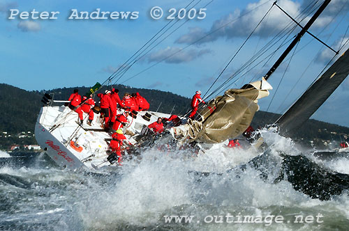 Back in 2005 when Mark Richards not only brought Wild Oats XI into Hobart with just a jib set and a damaged main. He also claimed line honours, just over 40 minutes ahead of Neville Crichton's Alfa Romeo and smashed the race record in the process. Photo copyright Peter Andrews, Outimage.