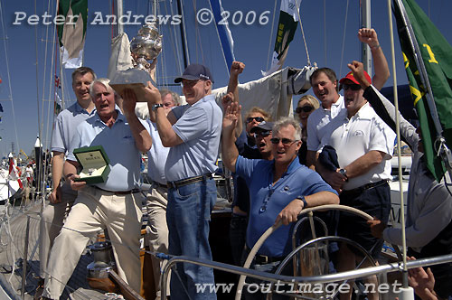 Richard de Leyser from Rolex Australia and Cruising Yacht Club of Australia's Commodore back in 2006, Geoff Lavis, presents a Rolex Yachtmaster and the Tattersalls Cup to Lindsay May, skipper of Love & War and crew for their overall win in 2006. Photo copyright Peter Andrews, Outimage.