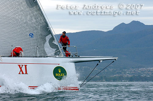 Wild Oats working up the Derwent to take line honours in the Rolex Sydney Hobart Yacht Race 2007. Photo copyright Peter Andrews, Outimage.