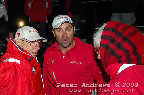 Mr and Mrs Robert Oatley greet Skipper Mark Richards, after Wild Oats XI arrived to Hobart to complete the Rolex Sydney Hobart Yacht Race 2009. Photo copyright Peter Andrews, Outimage.