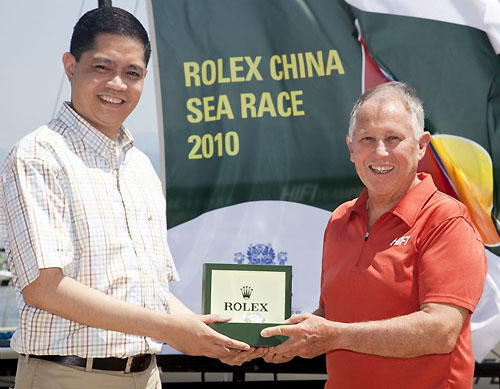 John de Luna from Rolex Philippines presents a Rolex Yacht-Master to Line Honours winner Neil Pryde, owner and skipper of Hi Fi, after his arrival in Subic Bay, completing the Rolex China Sea Race 2010. Photo copyright Daniel Forster, Rolex.