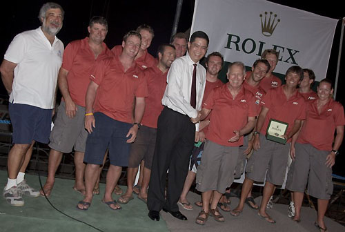 John de Luna from Rolex Philippines and Neil Pryde with Hi Fi's crew at the prizegiving for their overall and Line Honours win. Photo copyright Daniel Forster, Rolex.
