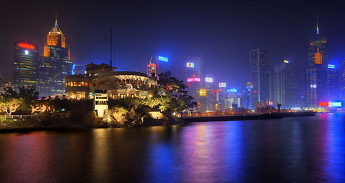 Royal Hong Kong Yacht Club with the city of Hong Kong in the background. Photo copyright Rolex, Carlo Borlenghi.