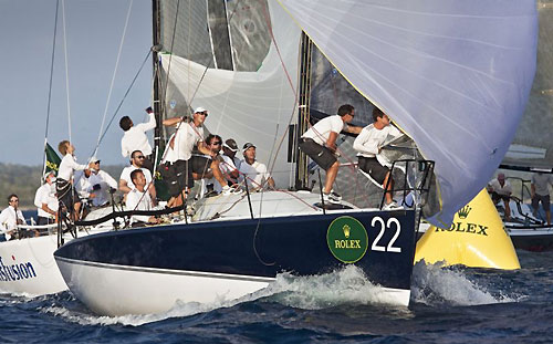 Hoisting spinnaker onboard Alessandro Barnaba's Fiamma, during the Rolex Farr 40 Worlds 2010 in Casa de Campo. Photo copyright Daniel Forster, Rolex.