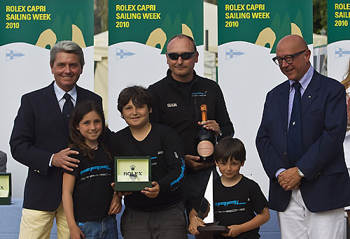 Fral 2 owner Alessandro Nespega receives a Rolex timepiece from Mr. Marini, Rolex Italy for finishing first in the Comet Class. Photo copyright Carlo Rolex and Borlenghi.