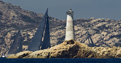 Fleet races past Monaci Island, during the Maxi Yacht Rolex Cup 2010. Photo copyright Rolex and Carlo Borlenghi.
